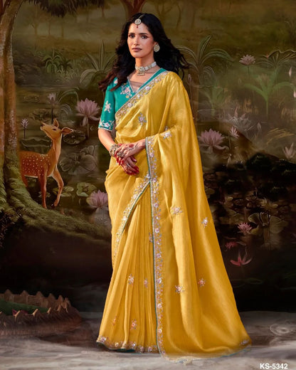 Mustard Yellow Silk Saree with Teal Embroidered V-Neck Blouse – Perfect for Weddings and Festive Occasions