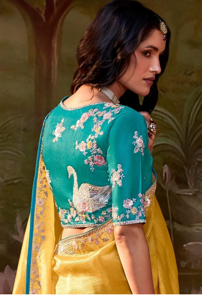 Mustard Yellow Silk Saree with Teal Embroidered V-Neck Blouse – Perfect for Weddings and Festive Occasions