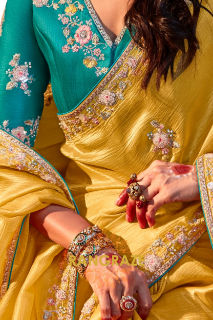 Mustard Yellow Silk Saree with Teal Embroidered V-Neck Blouse – Perfect for Weddings and Festive Occasions